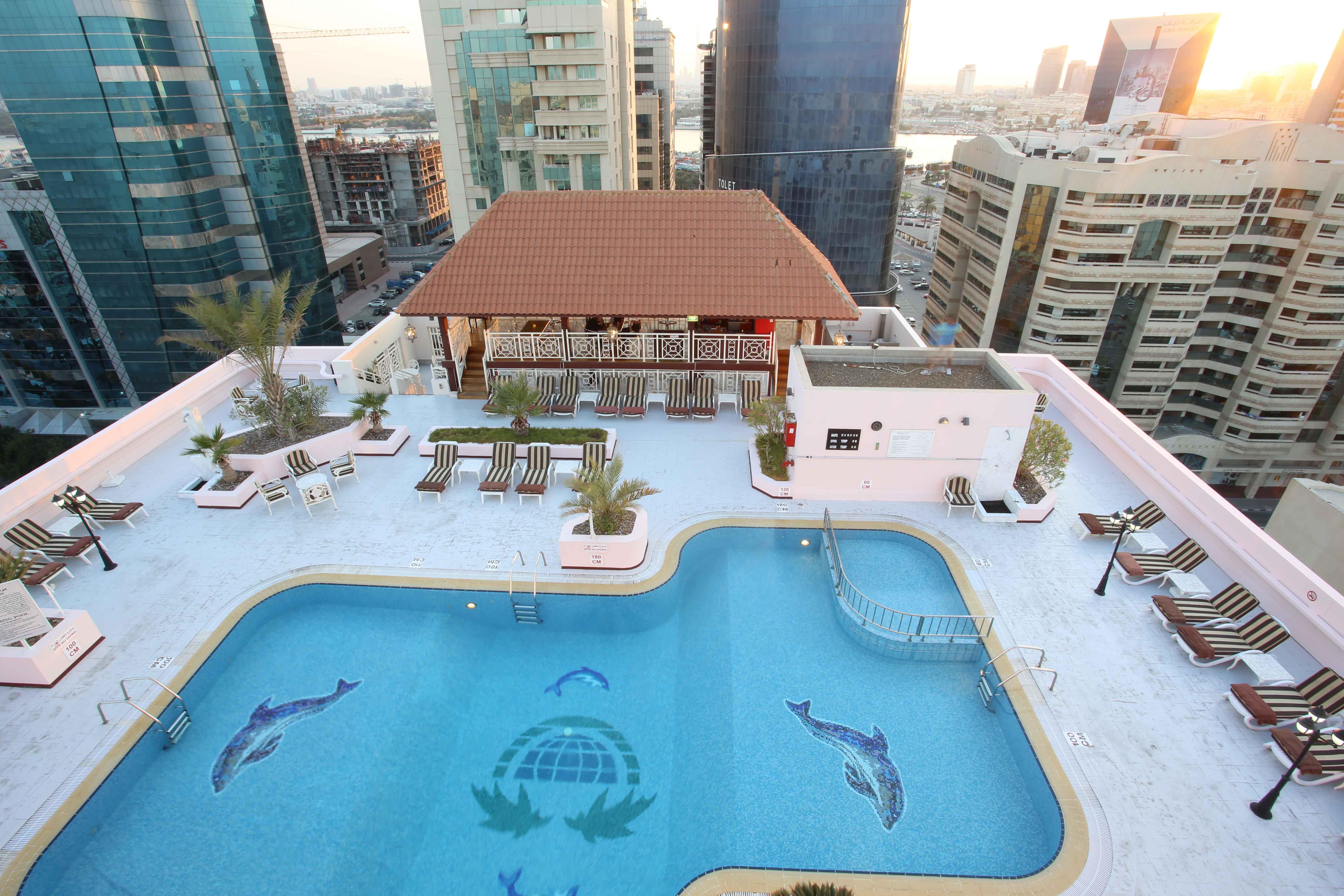 Knight Castle Hotel Dubai Exterior foto The swimming pool at the hotel